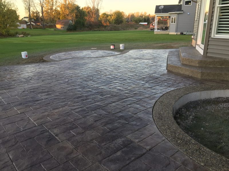 Stamped Concrete patio with Exposed Aggregate Border Concrete Driveways Stamped Concrete