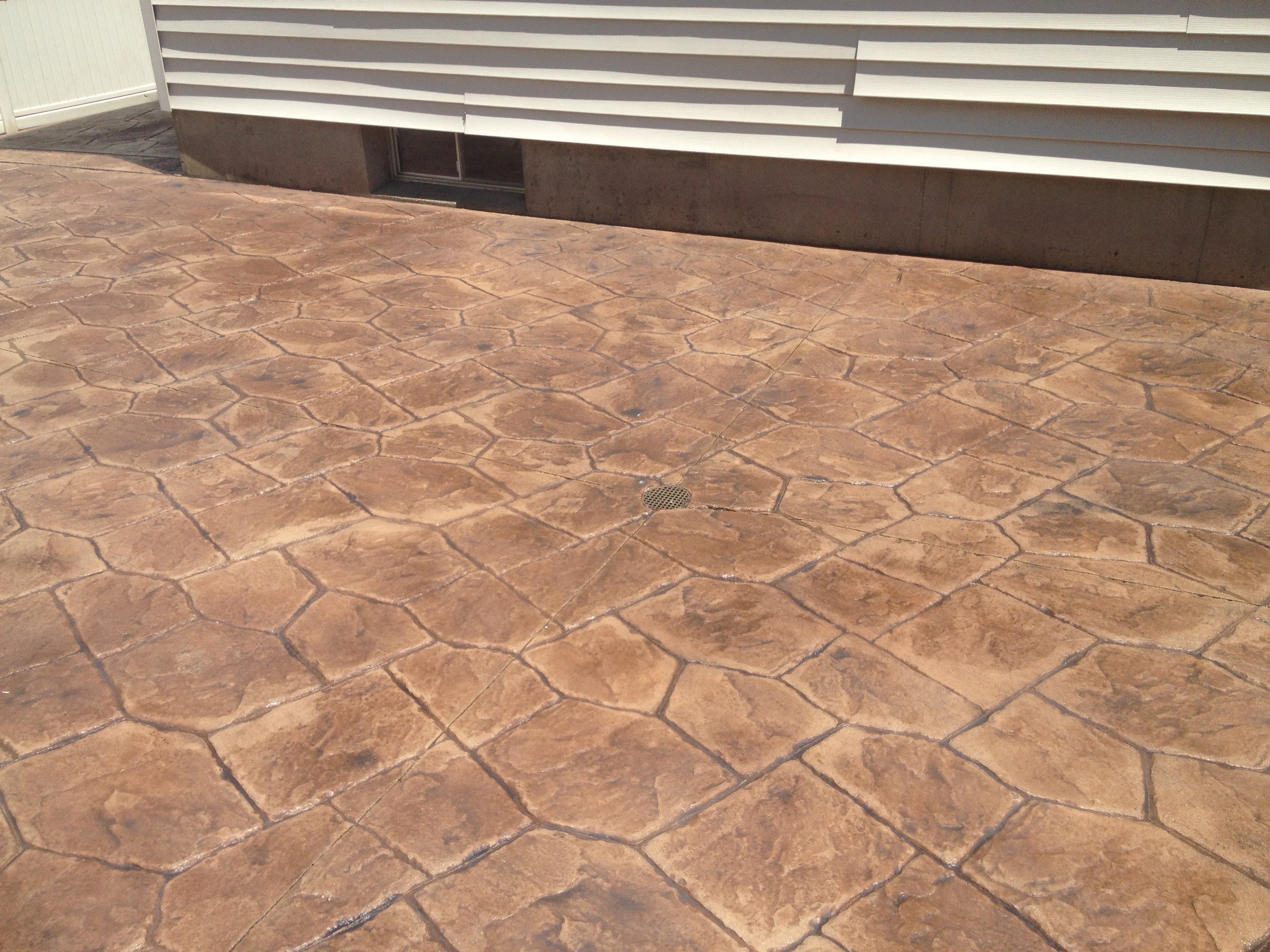 Stamped Concrete Pool Patio -castle random / trail dust / autumn brown release with light charcoal